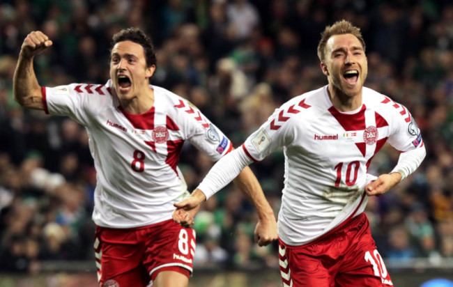 Christian Eriksen celebrates scoring their third goal with Thomas Delaney