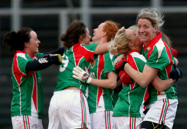 Aoife Loftus and Cora Staunton celebrate at the final whistle