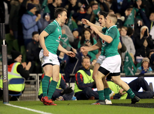 Darren Sweetnam celebrates his try with Joey Carbery and Andrew Conway