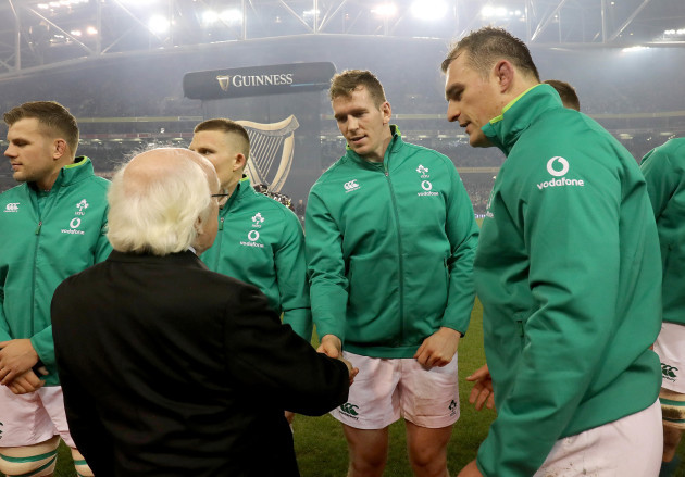 Chris Farrell is introduced to President of Ireland Michael D. Higgins by Rhys Ruddock