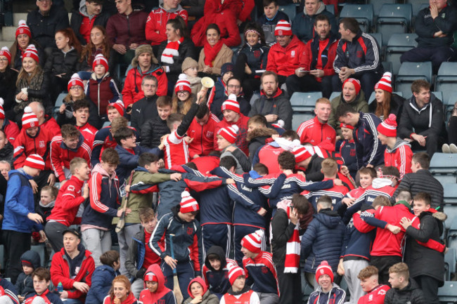 Cuala fans celebrate a goal