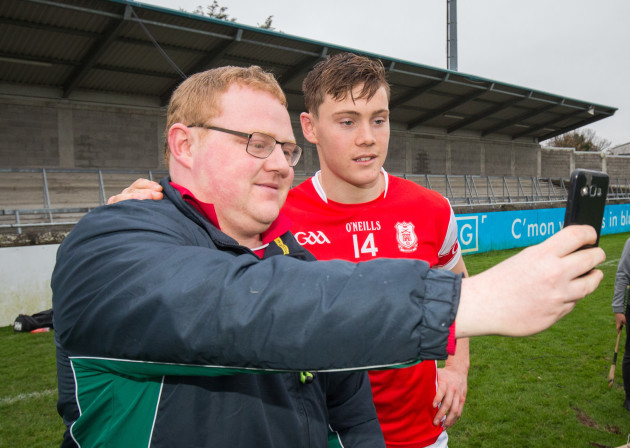 Con O'Callaghan takes a selfie with a fan after the match