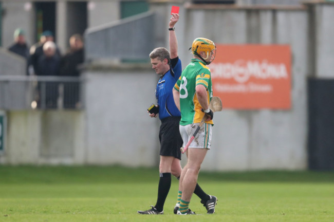 John O'Brien shows Cillian Kiely a red card