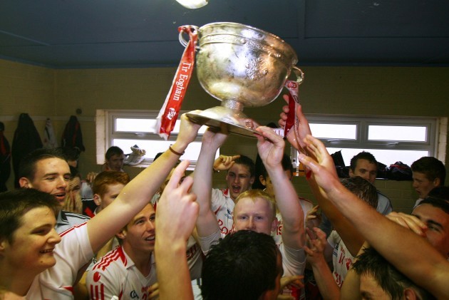 Tyrone players celebrate victory in their dressing room