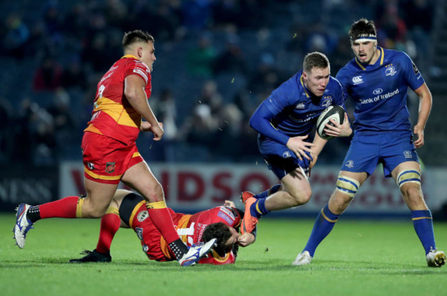 Rory O'Loughlin tackled by Adam Warren