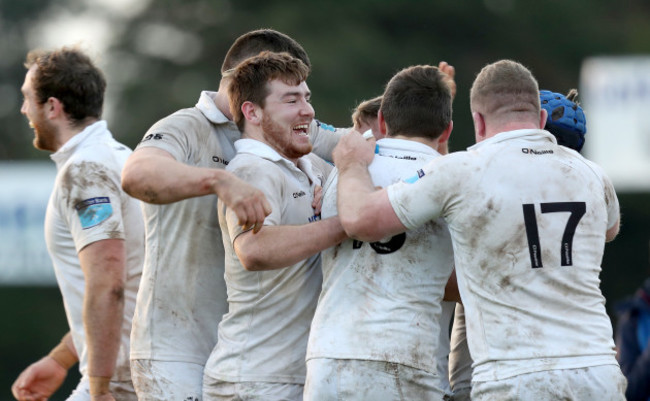 Cork Constitution celebrate at the final whistle