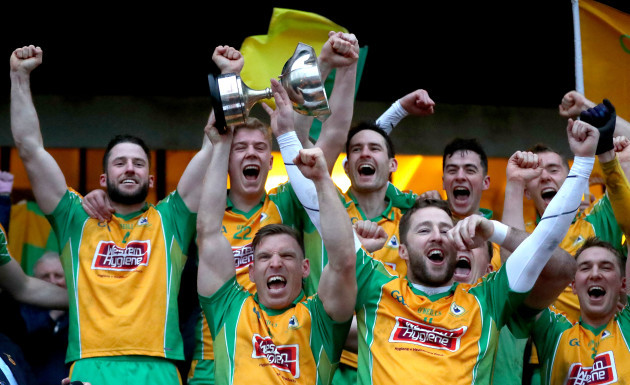 Ciaran McGrath and Micheal Lundy lift the trophy