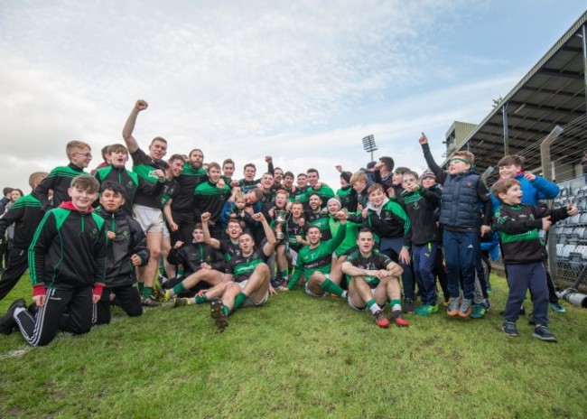 Nemo Rangers celebrate with the trophy after the game