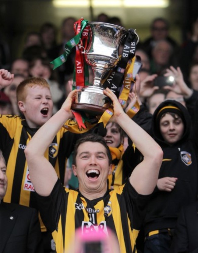 Stephen Kernan lifts the trophy