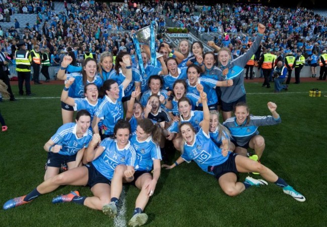 Dublin players celebrates with the Brendan Martin Cup