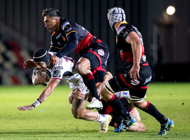 Christian Lealiifano is tackled by Gavin Henson