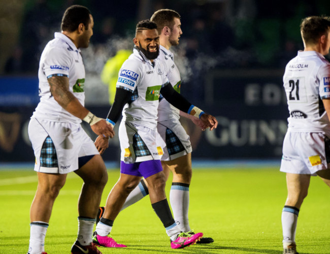 Niko Matawalu celebrates scoring a try with teammates