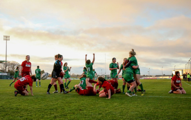 Connacht celebrate crossing for a try.