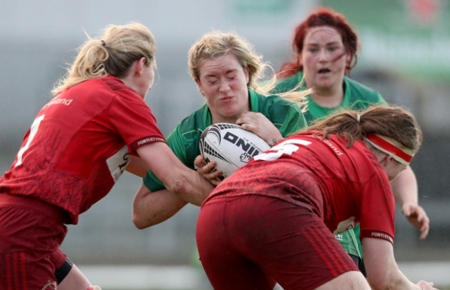 Chloe Pearse and Siobhan Fleming tackle Edel McMahon