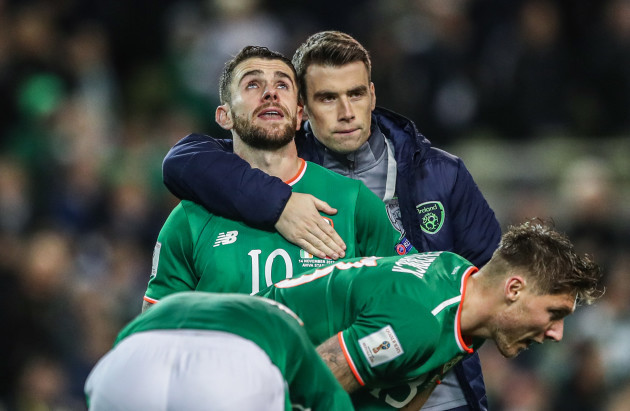 Robbie Brady and Seamus Coleman dejected after the match