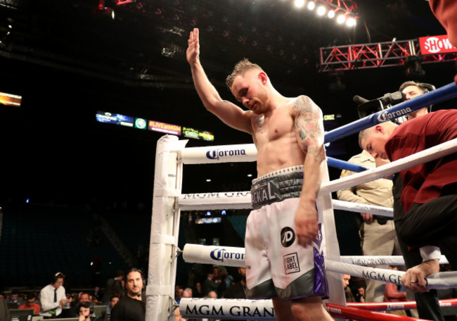 Carl Frampton dejected after losing