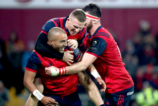 Simon Zebo celebrates scoring a try with Andrew Conway and Jean Kleyn