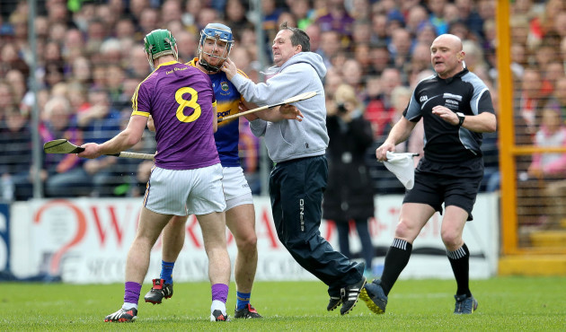 Davy Fitzgerald and Aidan Nolan clash with Jason Forde