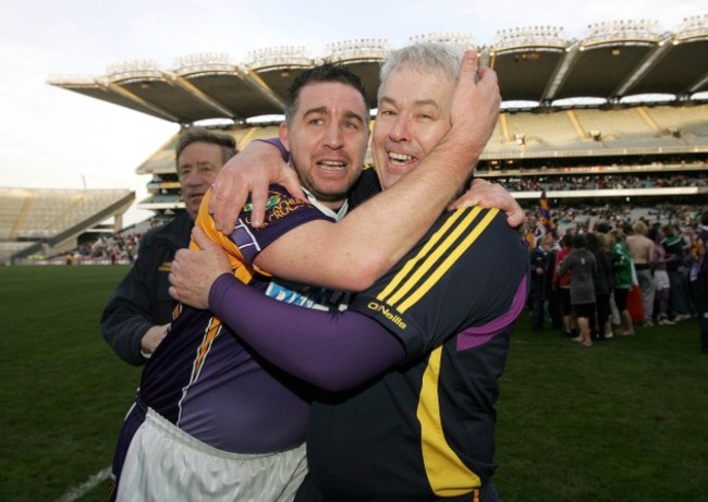 Manager Paddy Carr celebrates with captain Johnny Magge