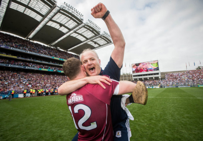 Michael Donoghue celebrates with Jonathan Glynn