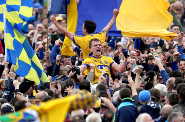 Enda Smith and Donal Smith celebrate with supporters in the crowd after the game