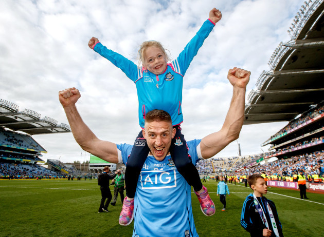 Eoghan O’Gara celebrates with his daughter Ella after the game