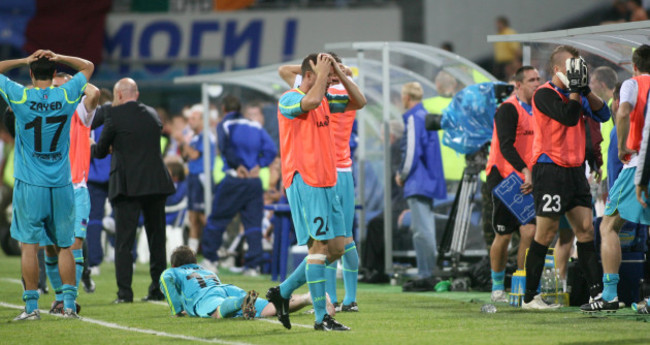 The Drogheda bench reacts to a late missed chance