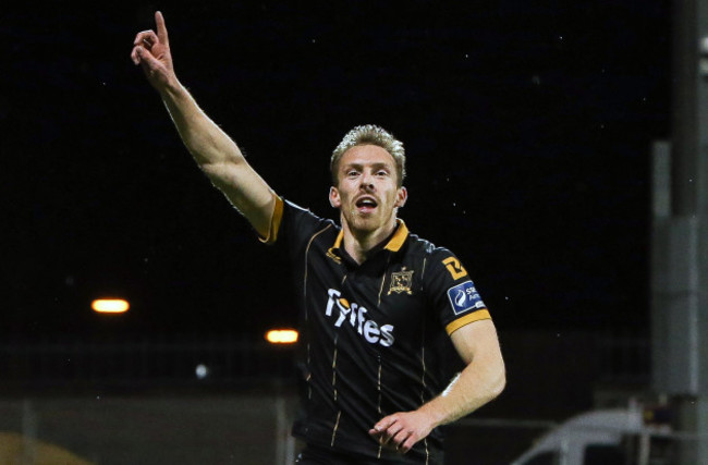 David McMillan celebrates scoring a goal