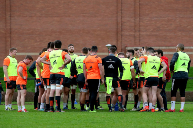 The Munster team huddle