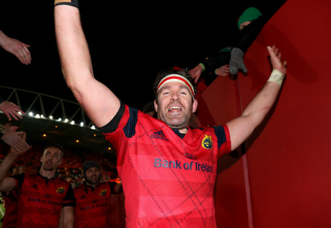 Billy Holland celebrates after the game