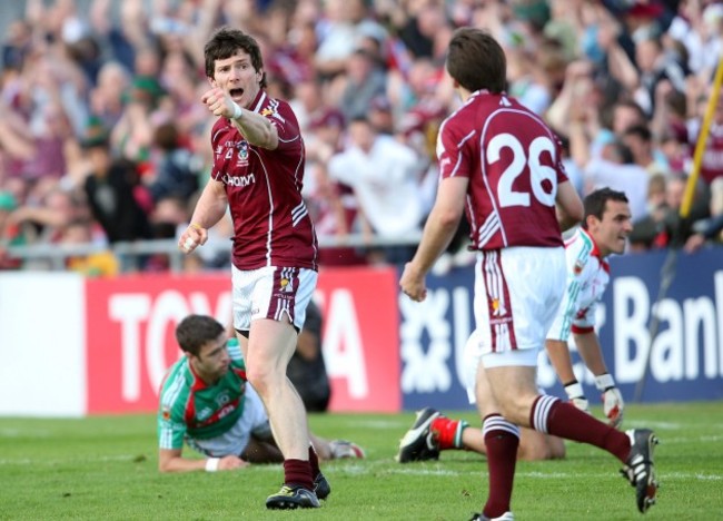 Michael Meehan celebrates his goal with Matthew Clancy