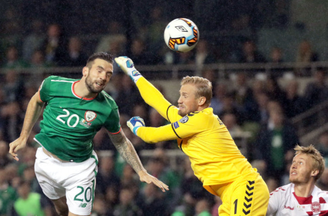 Shane Duffy scores their first goal past Kasper Schmeichel