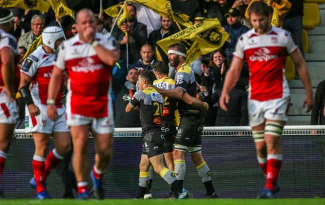 Jason Eaton celebrates scoring a try