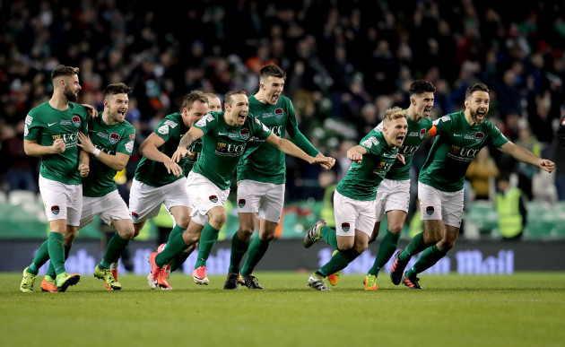 Cork City players celebrate the Kieran Sadlier kicking the winning penalty