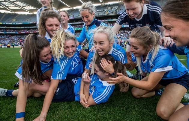 Dublin players celebrate with Noelle Healy