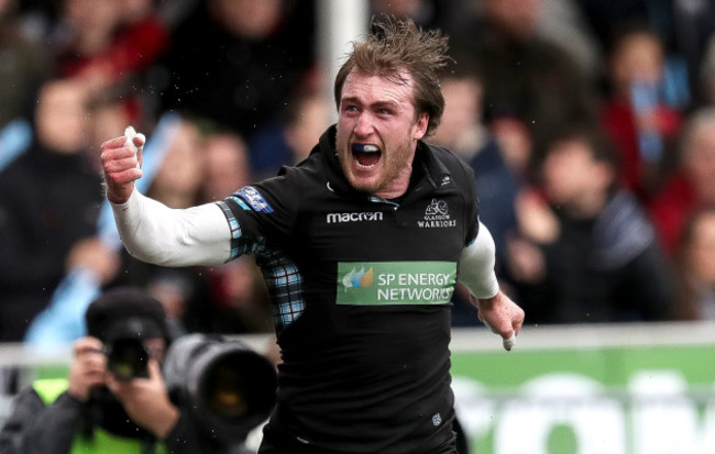 Stuart Hogg celebrates scoring his sides first try