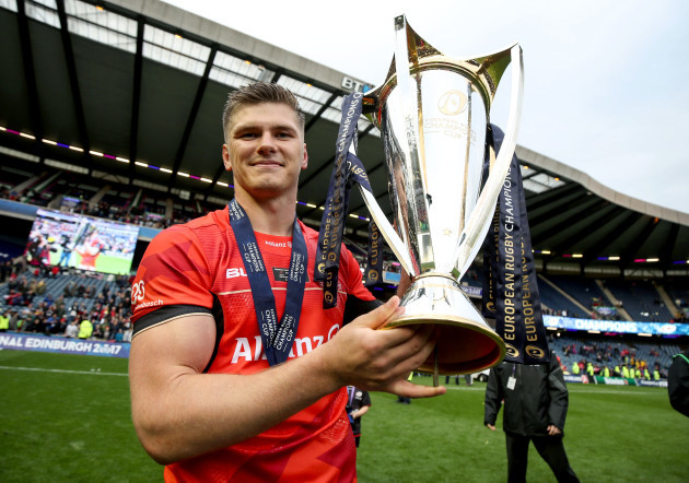 Owen Farrell celebrates with the trophy