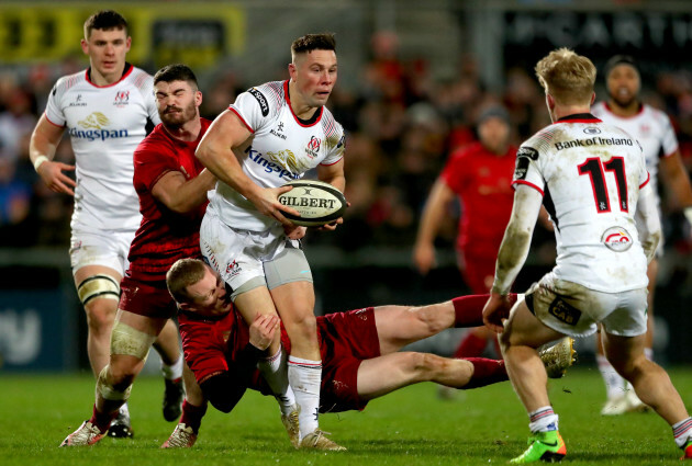 Sam Arnold and Keith Earls tackle John Cooney