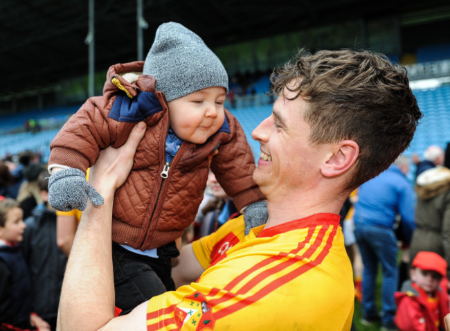 Mitchels' Neil Douglas celebrates with Adam Douglas after the game