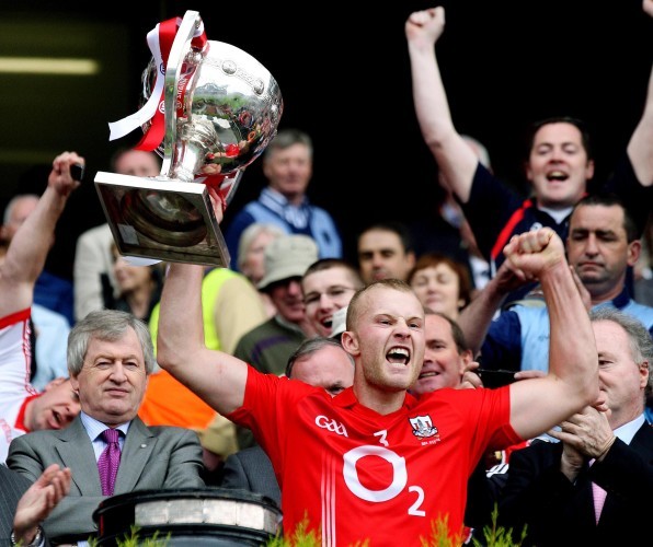 Michael Shields lifts the cup for Cork