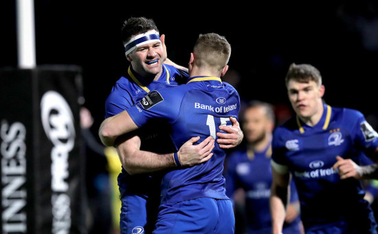 Jordan Larmour celebrates scoring the first try with Fergus McFadden