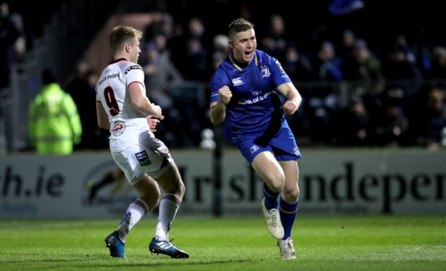 Jordan Larmour celebrates scoring the first try