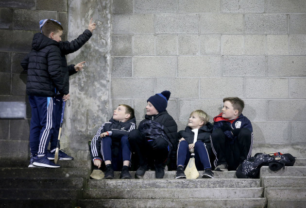 Young members of Fingalians GAA share a joke in the stands