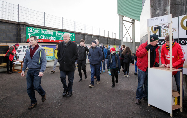 Spectators leave MacHale Park after the game was called off