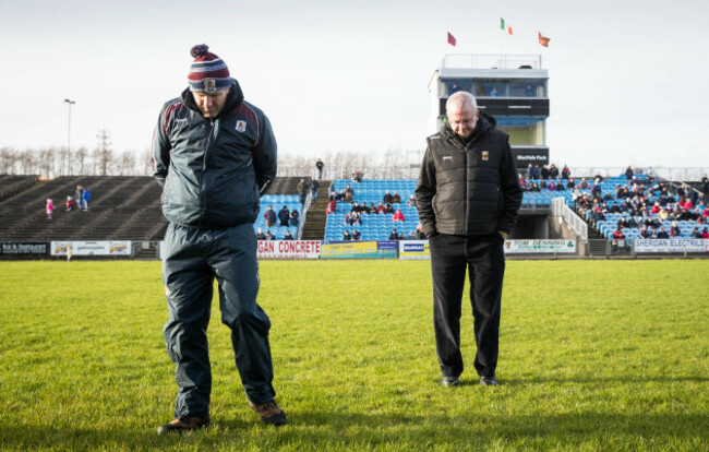 Kevin Walsh inspects the pitch