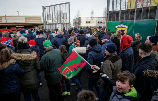 Spectators leave MacHale Park after the game was called off