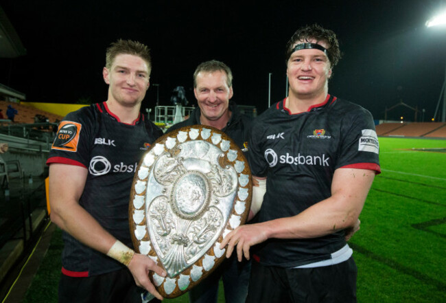 Jordie Barrett and Scott Barrett celebrate winning with their father Kevin