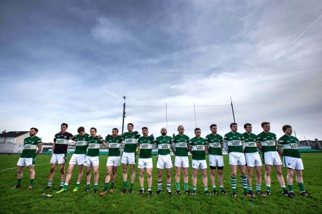 Portlaoise players stand together for the national anthem