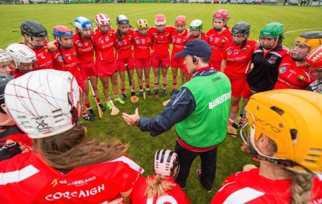 Cork manager Paudie Murray talks in the team huddle