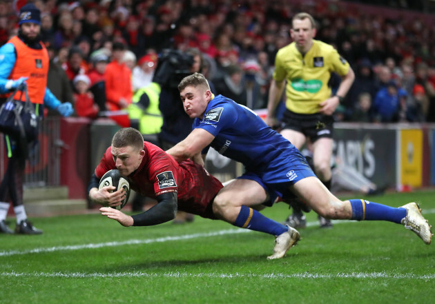 Andrew Conway scores a try despite Jordan Larmour